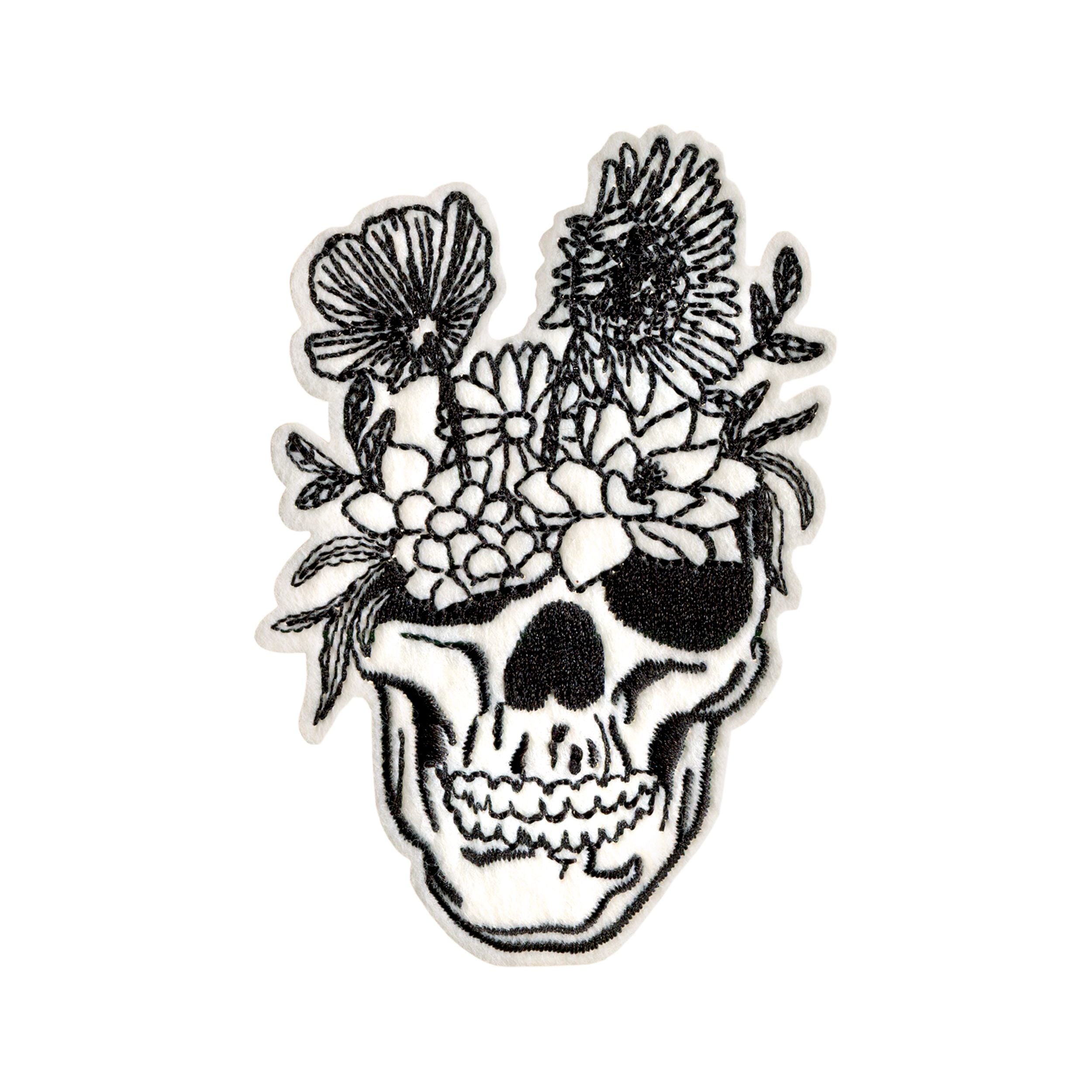 Merkki pääkallo kierrätysmateriaalista